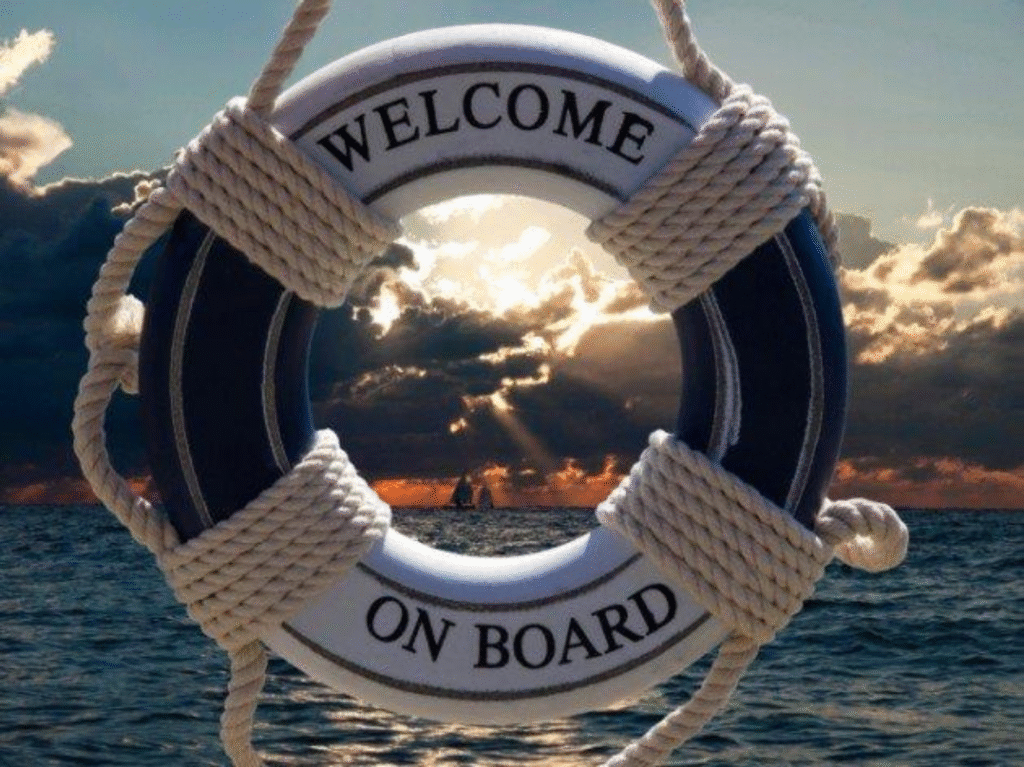 Lifebuoy displaying the words Welcome on Board above the ocean
